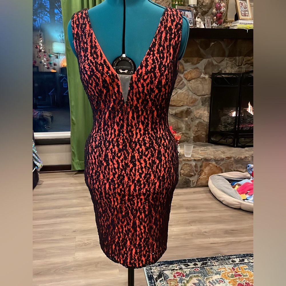Coral and black lace cocktail